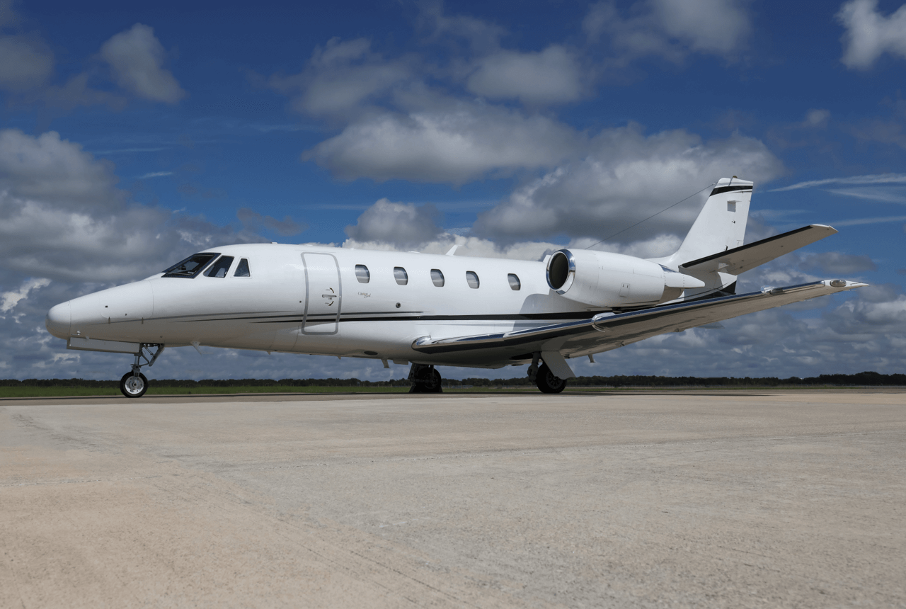 Cessna Citation Excel parked at private airport