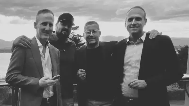 The four founders 5x5 Trading smiling looking in the camera.